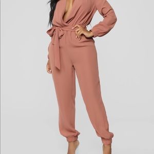 Blush or rustic pink colored one piece set. Size large